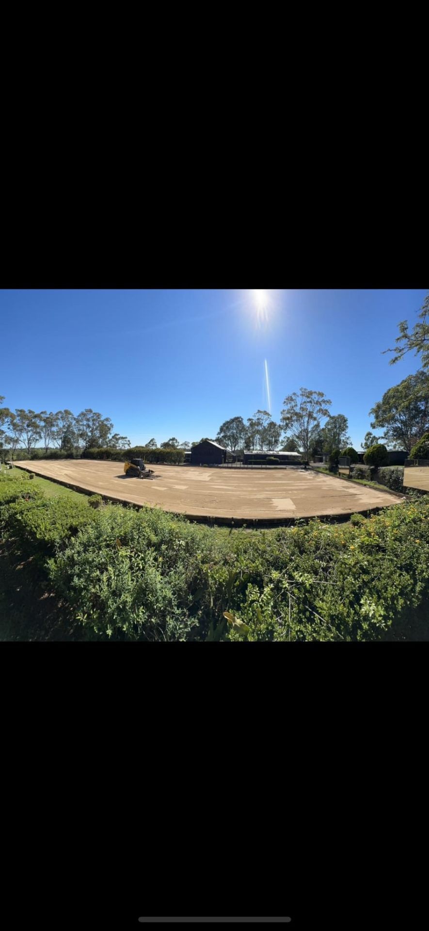 Large arena pad prep with skid steer