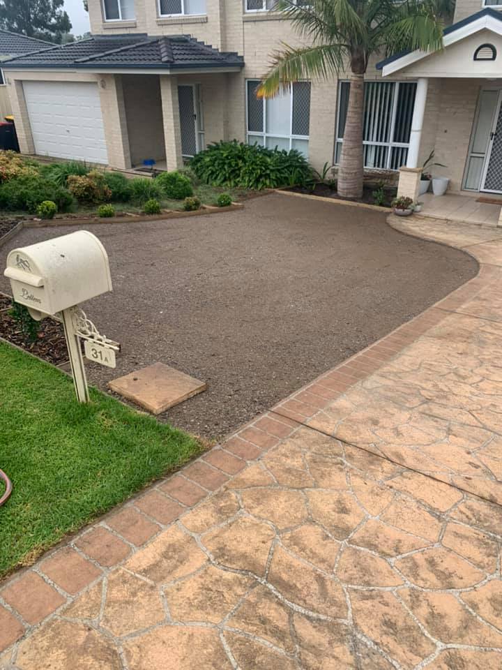 Compacted driveway base ready for finish