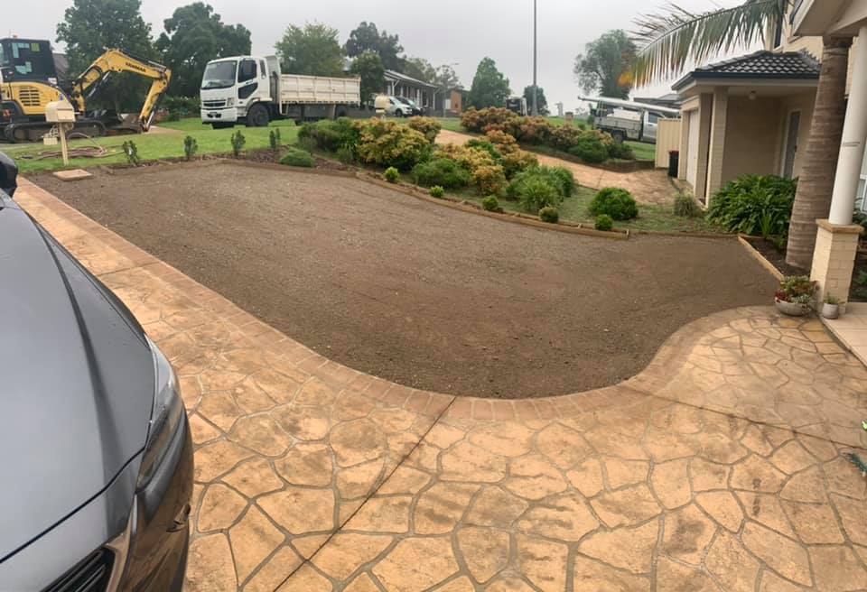 Driveway prep with excavator & tipper