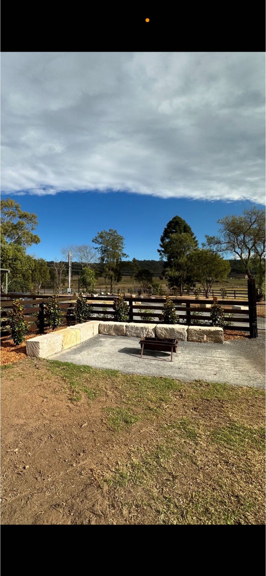 Sandstone firepit area with gravel base