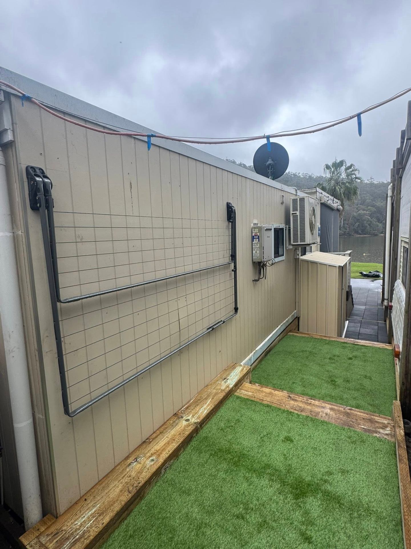 Houseboat side deck with artificial turf