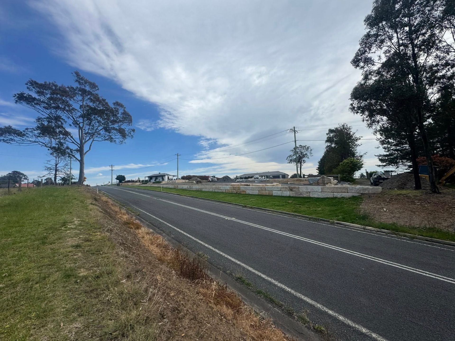 Roadside sandstone retaining & landscaping