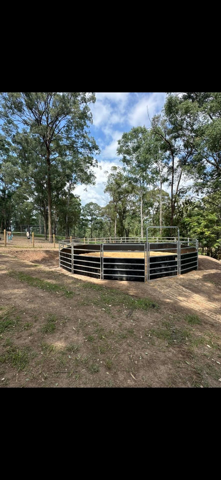Steel round yard with sand base for horses