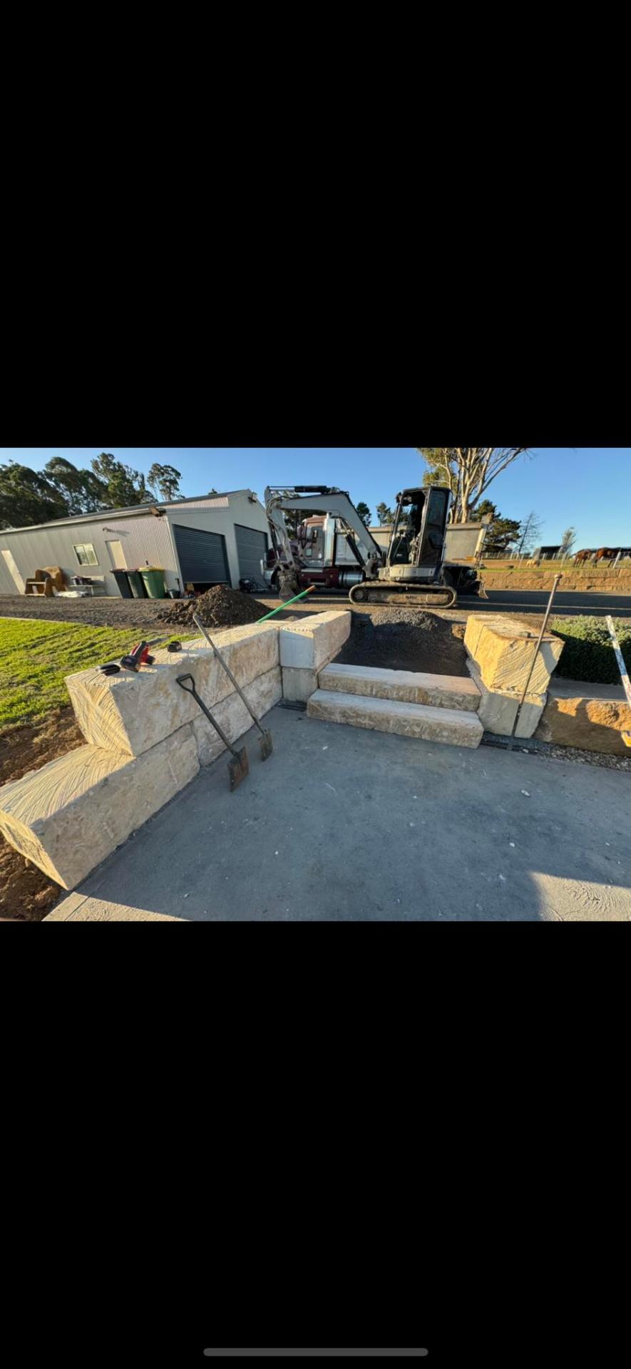 Sandstone block steps & retaining with excavator